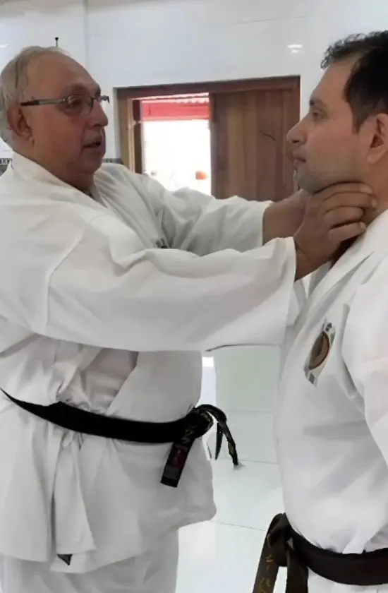 Sensei Hoshi P. Batliwala and Sensei Percy Batliwala demonstrating a self-defense technique at the O.G.K.S India karate class in Worli, Mumbai